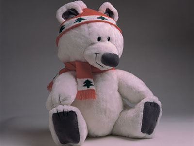white teddy bear with red cap