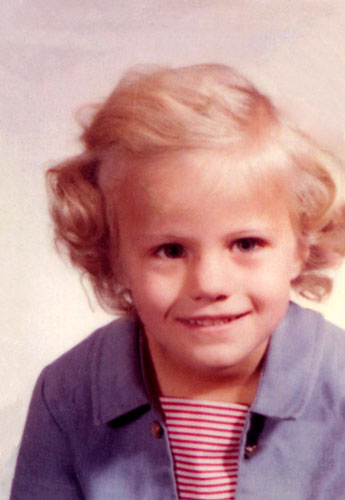 old photo of young girl smiling