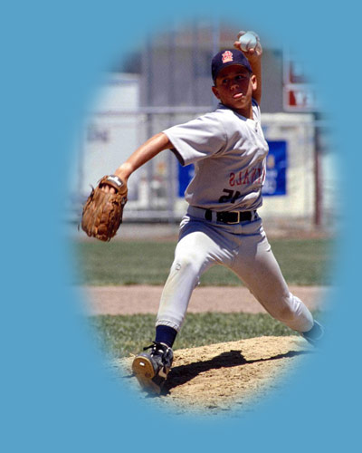 kid in baseball uniform throwing baseball as pitcher